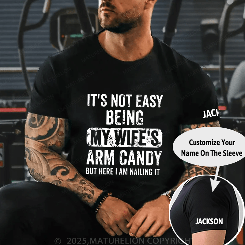 It's Not Easy Being My Wife's Arm Candy But Here I Am Nailing It Cotton T-shirt (Free Customization)