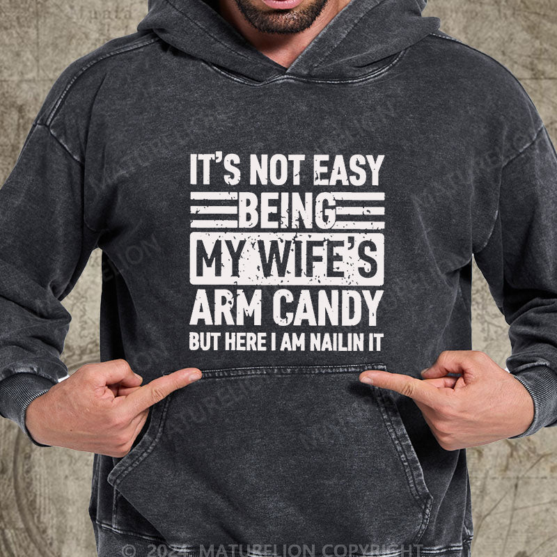 Maturelion It's Not Easy Being My Wife's Arm Candy But Here I'm Nailing It DTG Printing Washed Custom Hoodie