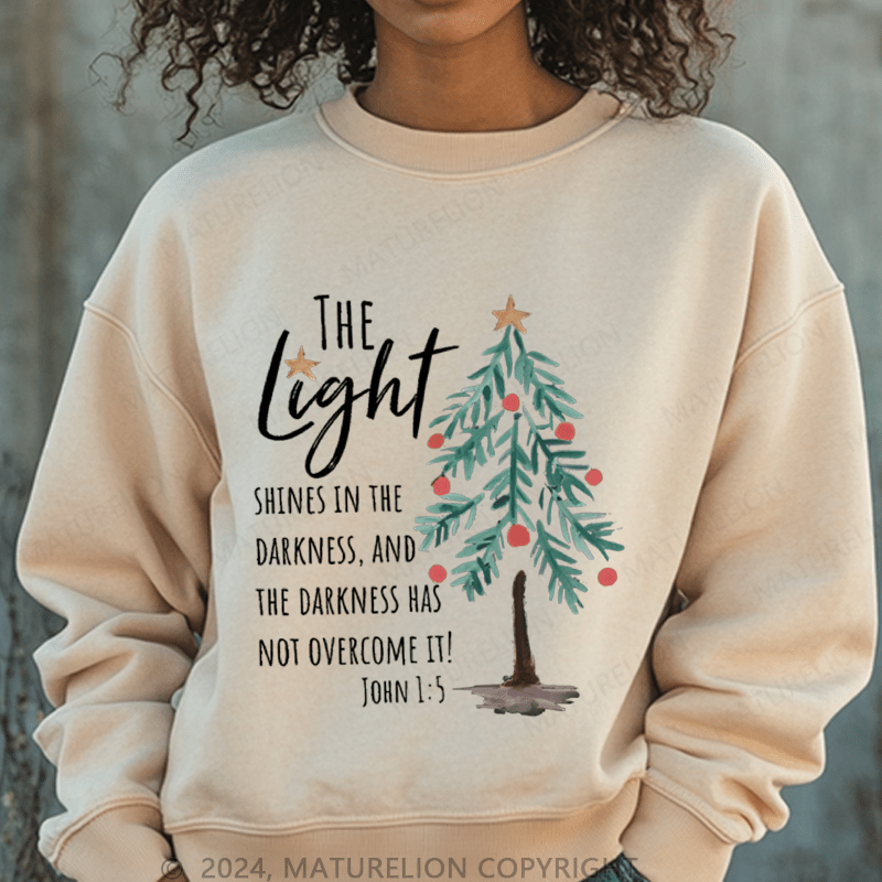Maturelion Christmas Sweatshirt The Light Shines In The Darkness Women Sweatshirt